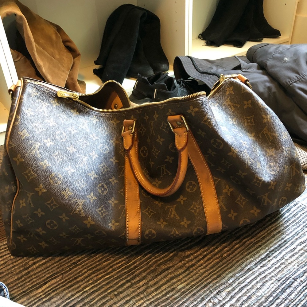 AUTHENTIC LV 55 travel bag.. used and loved!